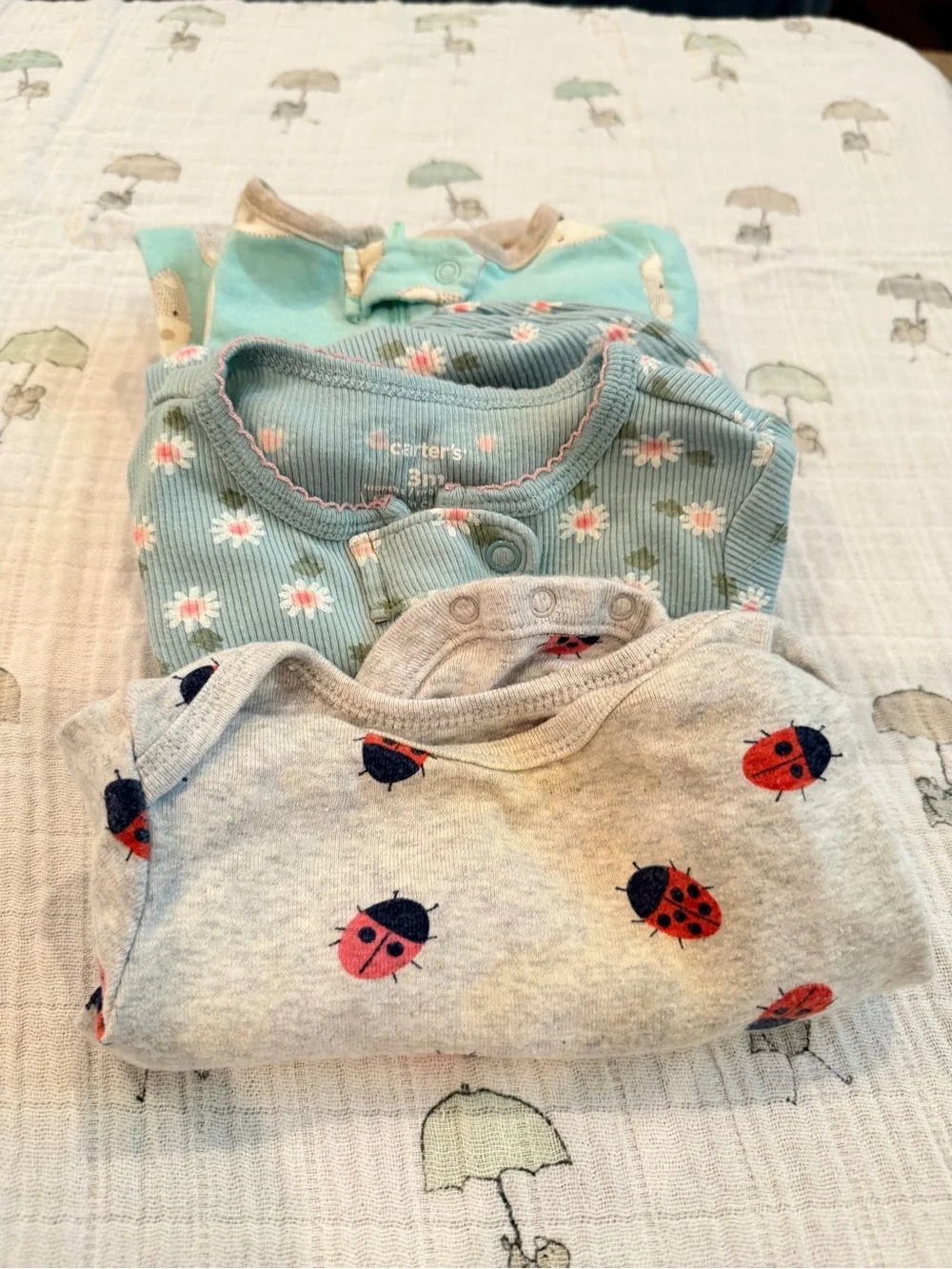Bundle of 1 onesie and 2 footed sleepers